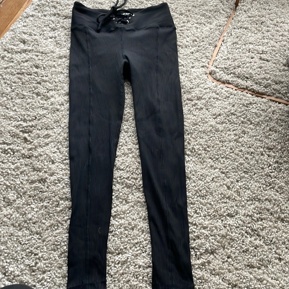 Year of Ours ribbed lace up leggings with football like tie. Like new Worn once
